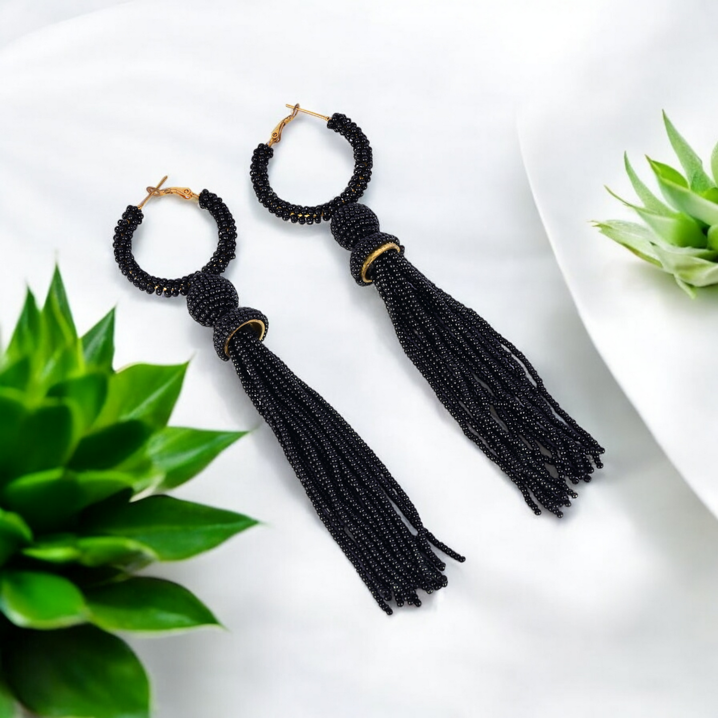 Elegant Black Beaded Hoop Earrings with Tassel Detail
