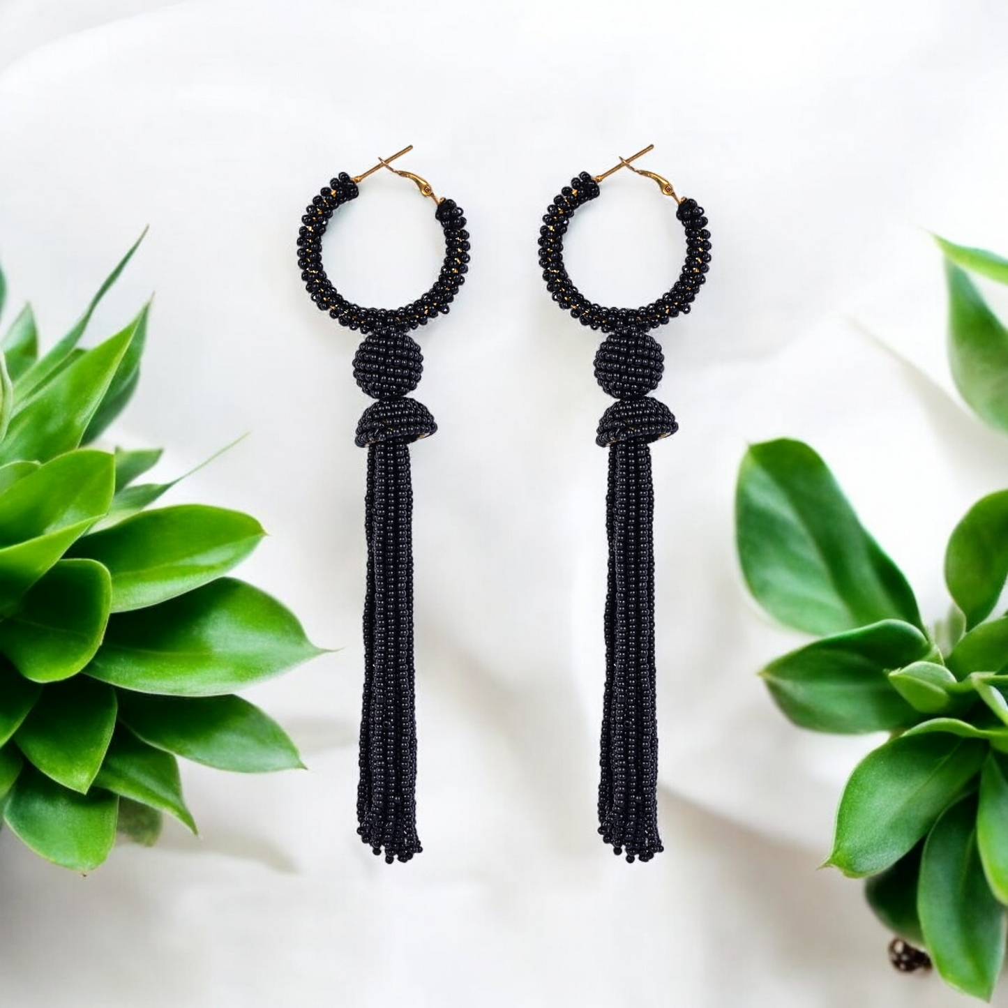Elegant Black Beaded Hoop Earrings with Tassel Detail