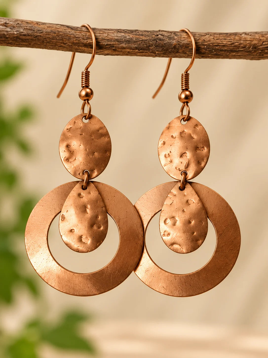 Handmade copper drop earrings with hammered round design