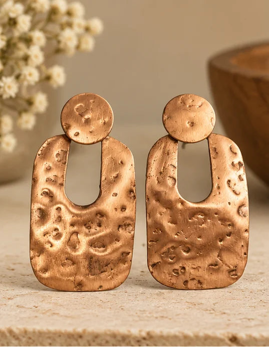 Hammered copper drop earrings with a textured copper finish