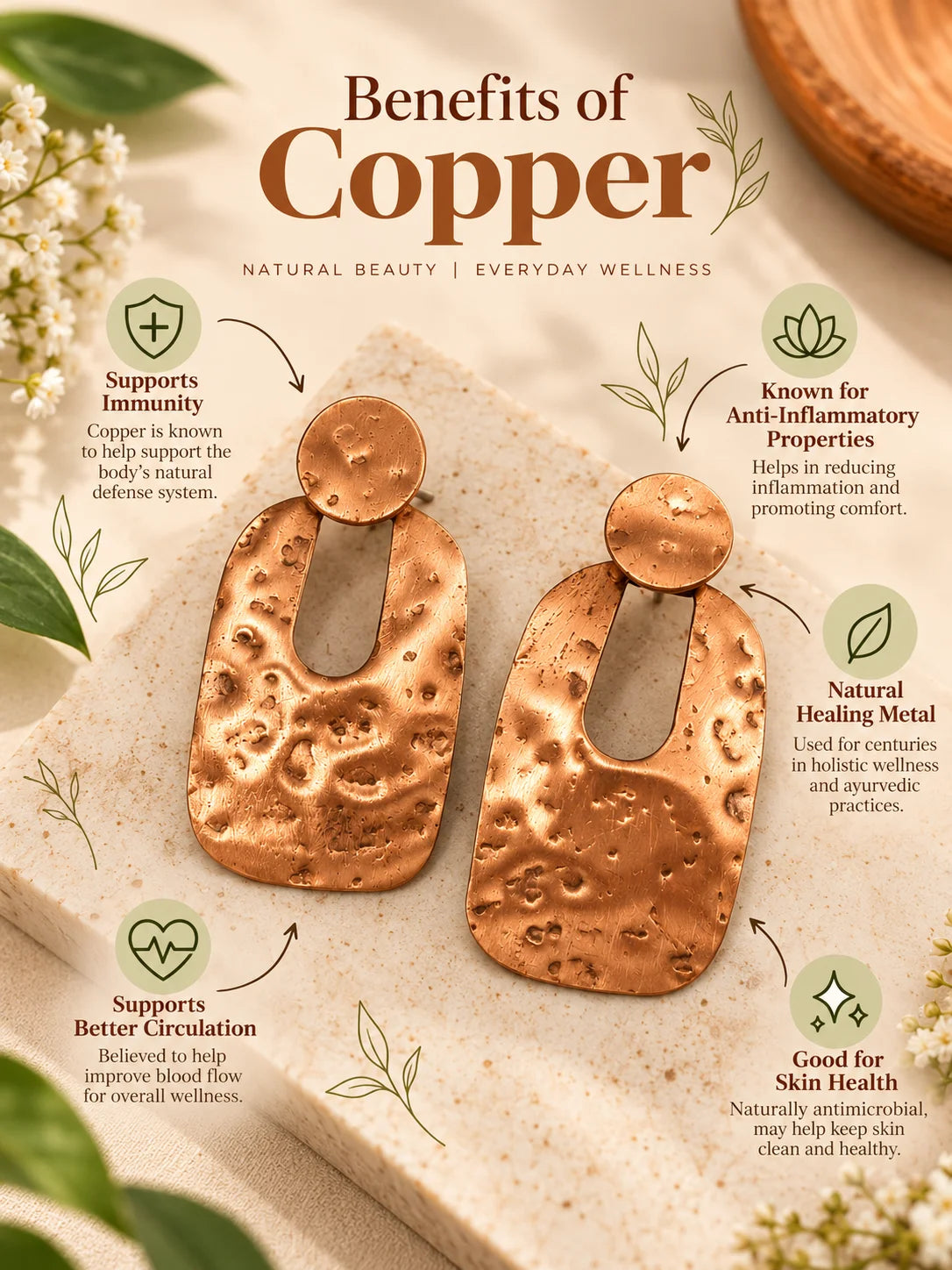 Hammered copper drop earrings with a distinctive geometric shape