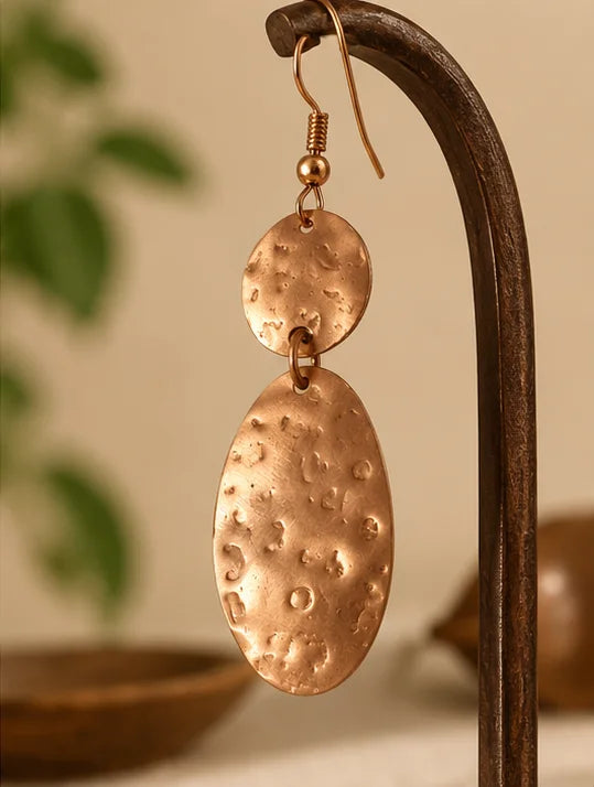 Hammered copper oval drop earrings with textured finish